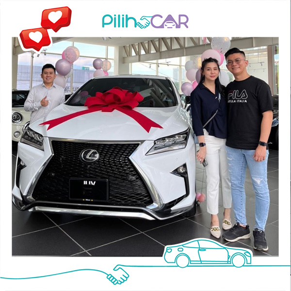 Mr. and Mrs Teh with their Lexus RX